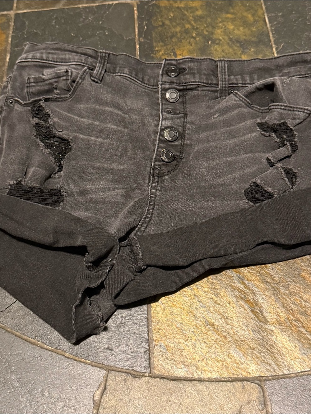 Vintage Women's Distressed Black Denim Shorts
